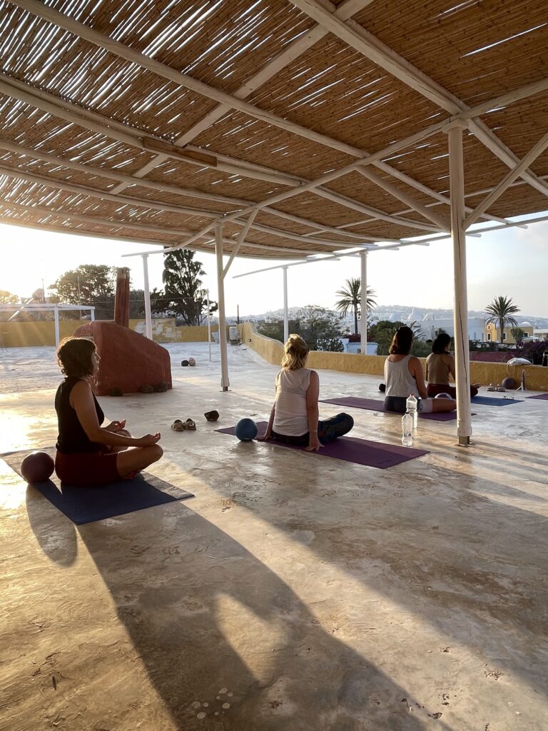Santorini yoga retreat rooftop